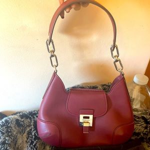 Michael kors burgundy purse like new used once more of a bookbag person